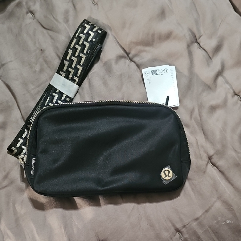 Lululemon Black Zip Belt Bag with Gold Logo Accent